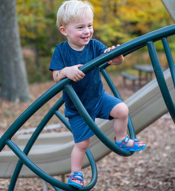 Climbing on the playground and in the garden is an essential activity for kids
